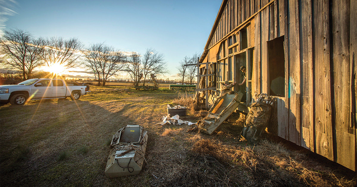 Waterfowl hunter organizing gear for the upcoming season. Photo by Bill Konway.jpg